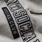 Quarter-zip sweatshirt with matching appliqués – Grey