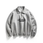 Quarter-zip sweatshirt with matching appliqués – Grey
