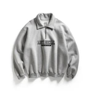 Quarter-zip sweatshirt with matching appliqués – Grey